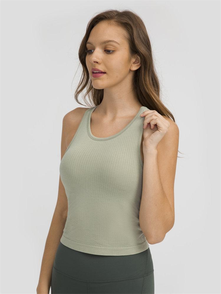 Women wearing a seamless full-length racerback tank top with built-in bra, ideal for workouts and fitness activities.