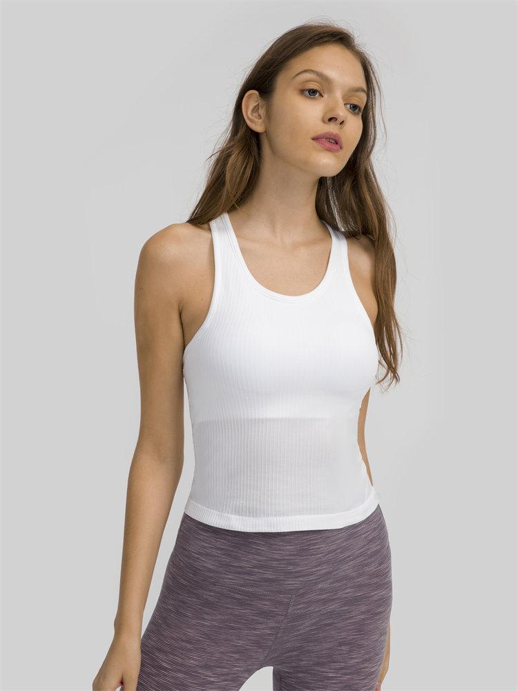 Women wearing a seamless full-length racerback tank top with built-in bra, ideal for workouts and fitness activities.