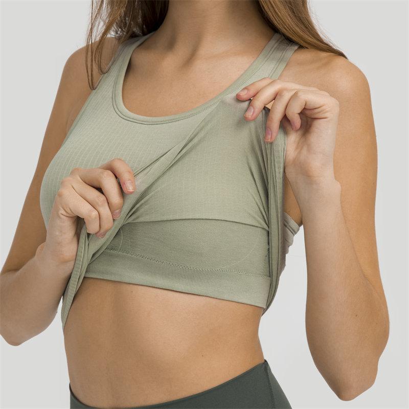 Women wearing a seamless full-length racerback tank top with built-in bra, ideal for workouts and fitness activities.