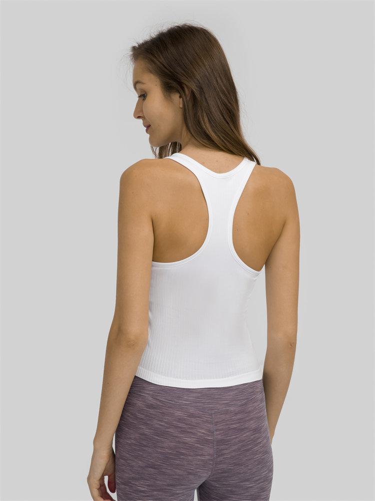 Women wearing a seamless full-length racerback tank top with built-in bra, ideal for workouts and fitness activities.