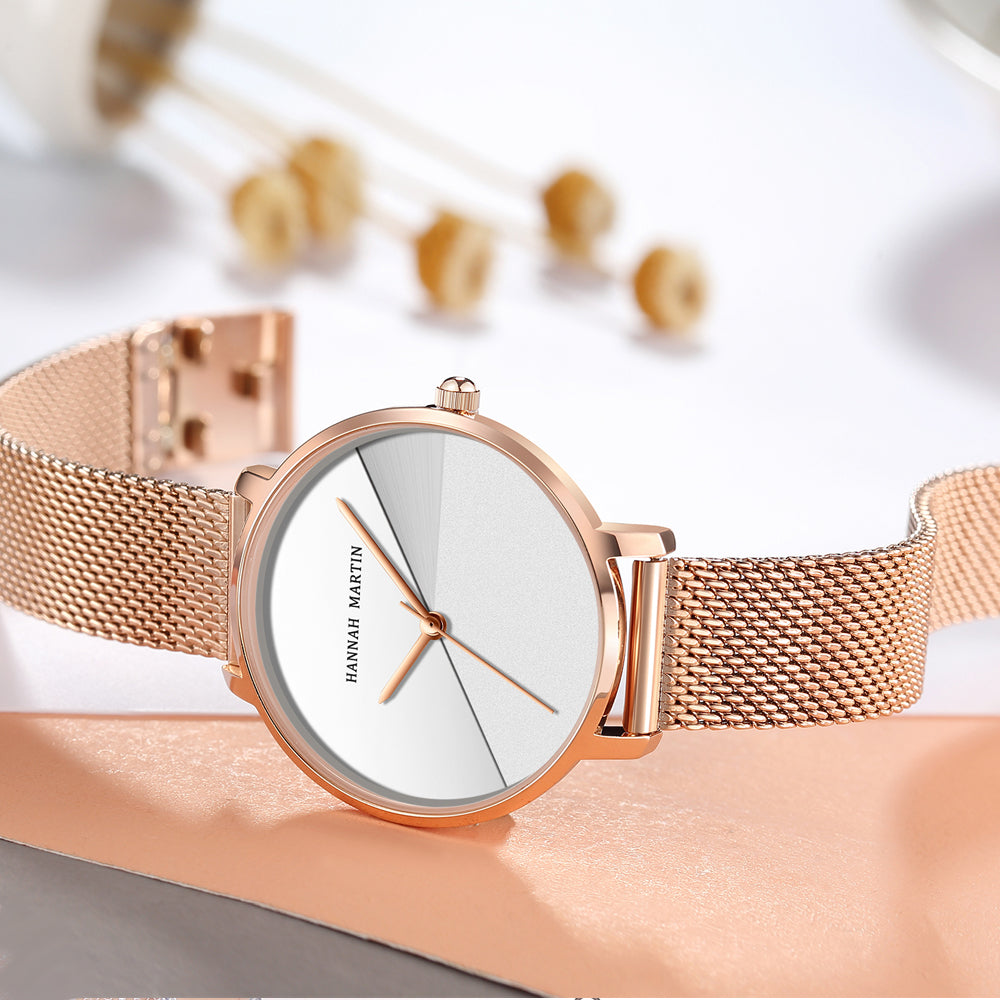 Luxury women's watch featuring Japan Quartz movement and stainless steel band, showcasing a stylish splice dial.