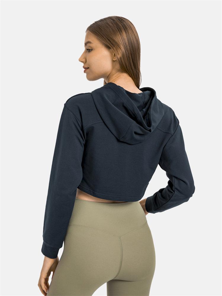 Women wearing a stylish crop hoodie with long sleeves, perfect for workouts and casual outings, showcasing a blend of comfort and fashion.