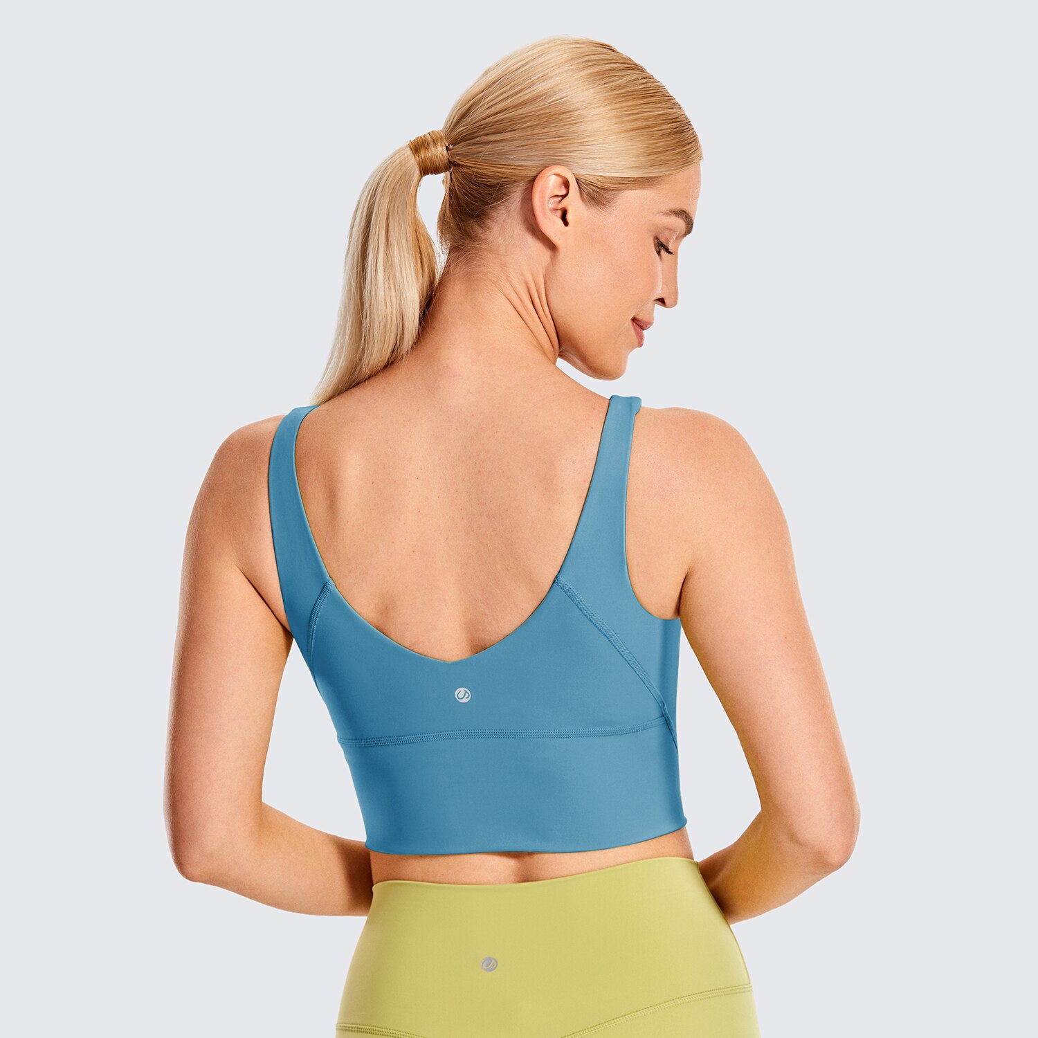 Women's High Neck Longline Sports Bra featuring a V-back design, wire-free support, and breathable fabric, perfect for workouts and yoga.