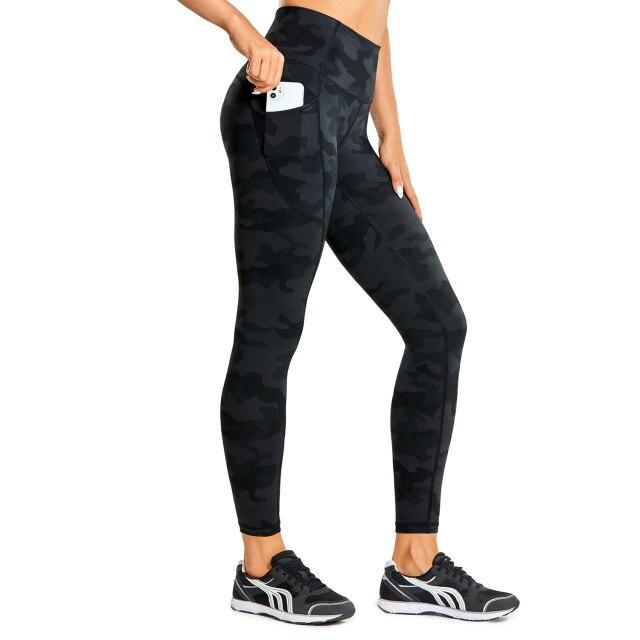 Women's Hugged Feeling Training Leggings in black, featuring a compression fit, tummy control, and pockets for convenience.