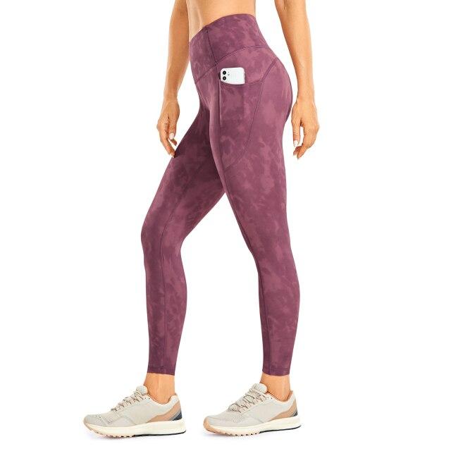 Women's Hugged Feeling Training Leggings in black, featuring a compression fit, tummy control, and pockets for convenience.