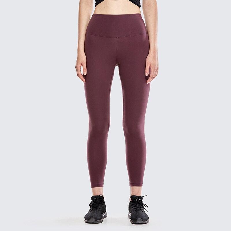 Women's Naked Feeling II High Waist Yoga Leggings in black, featuring a high waist and side pocket for convenience during workouts.