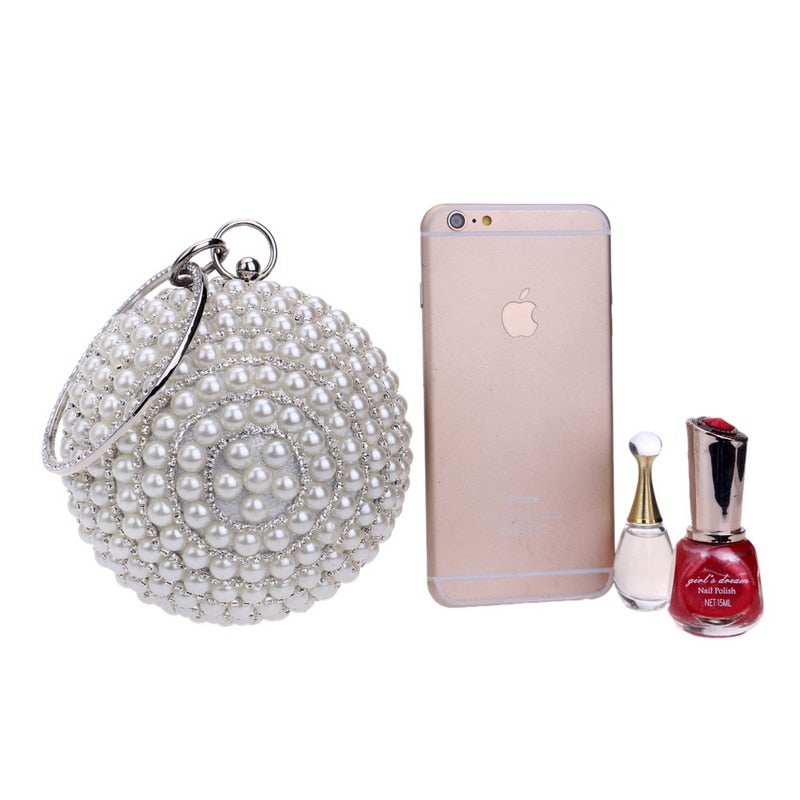 A stylish Women's Pearl Beaded Evening Bag featuring intricate pearl beads and a circular design, perfect for weddings and special occasions.