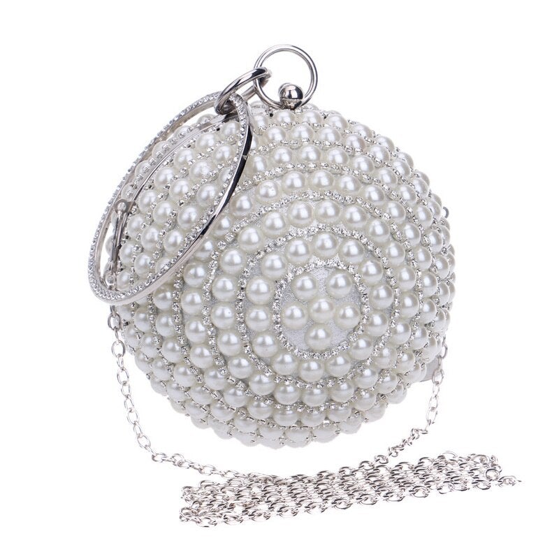 A stylish Women's Pearl Beaded Evening Bag featuring intricate pearl beads and a circular design, perfect for weddings and special occasions.