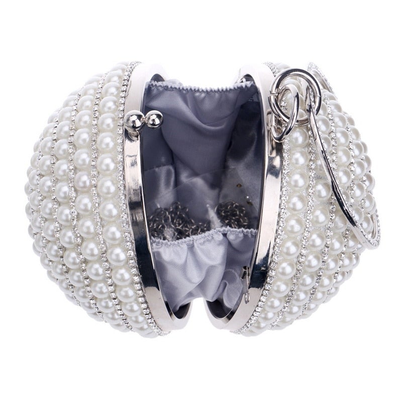 A stylish Women's Pearl Beaded Evening Bag featuring intricate pearl beads and a circular design, perfect for weddings and special occasions.