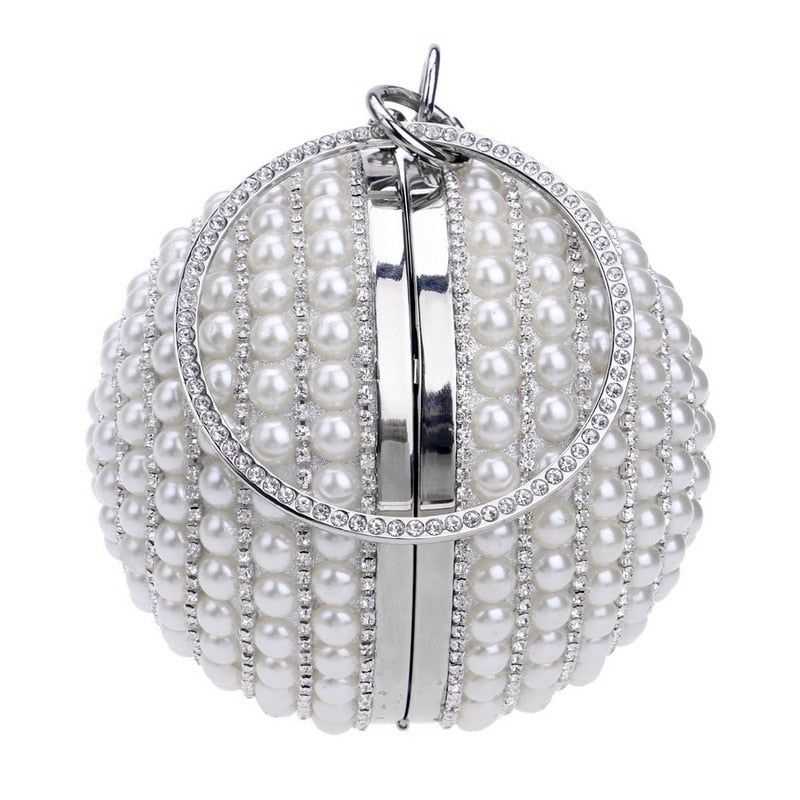 A stylish Women's Pearl Beaded Evening Bag featuring intricate pearl beads and a circular design, perfect for weddings and special occasions.