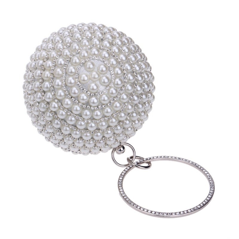 A stylish Women's Pearl Beaded Evening Bag featuring intricate pearl beads and a circular design, perfect for weddings and special occasions.