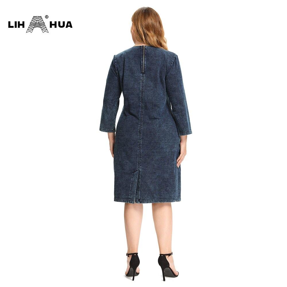 A stylish Women's Plus Size Denim Dress featuring a sheath silhouette, three-quarter sleeves, and shoulder pads, perfect for casual wear.