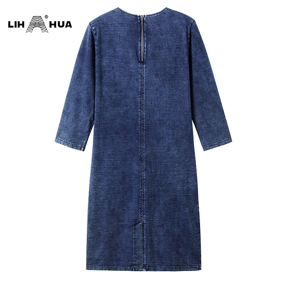 A stylish Women's Plus Size Denim Dress featuring a sheath silhouette, three-quarter sleeves, and shoulder pads, perfect for casual wear.