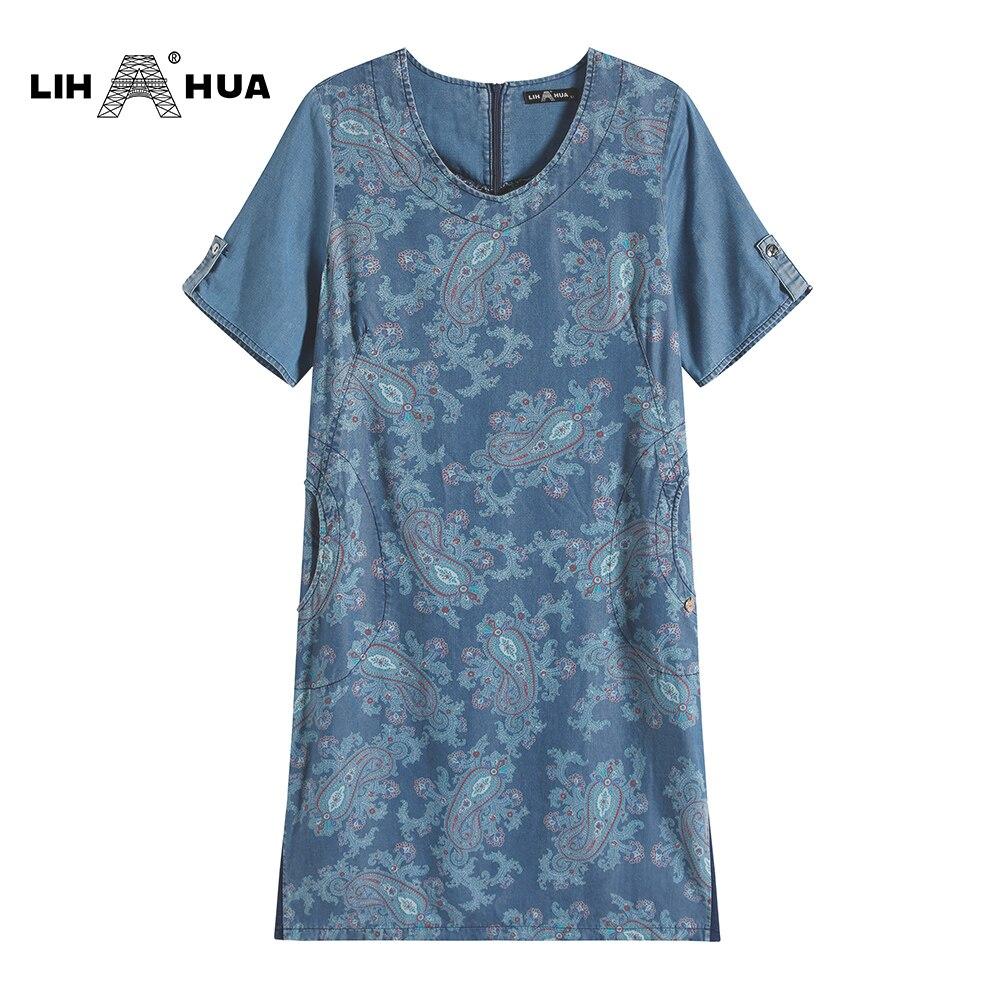 Women's Plus Size Denim Dress featuring a V-neck, short sleeves, and knee-length design, perfect for summer casual wear.