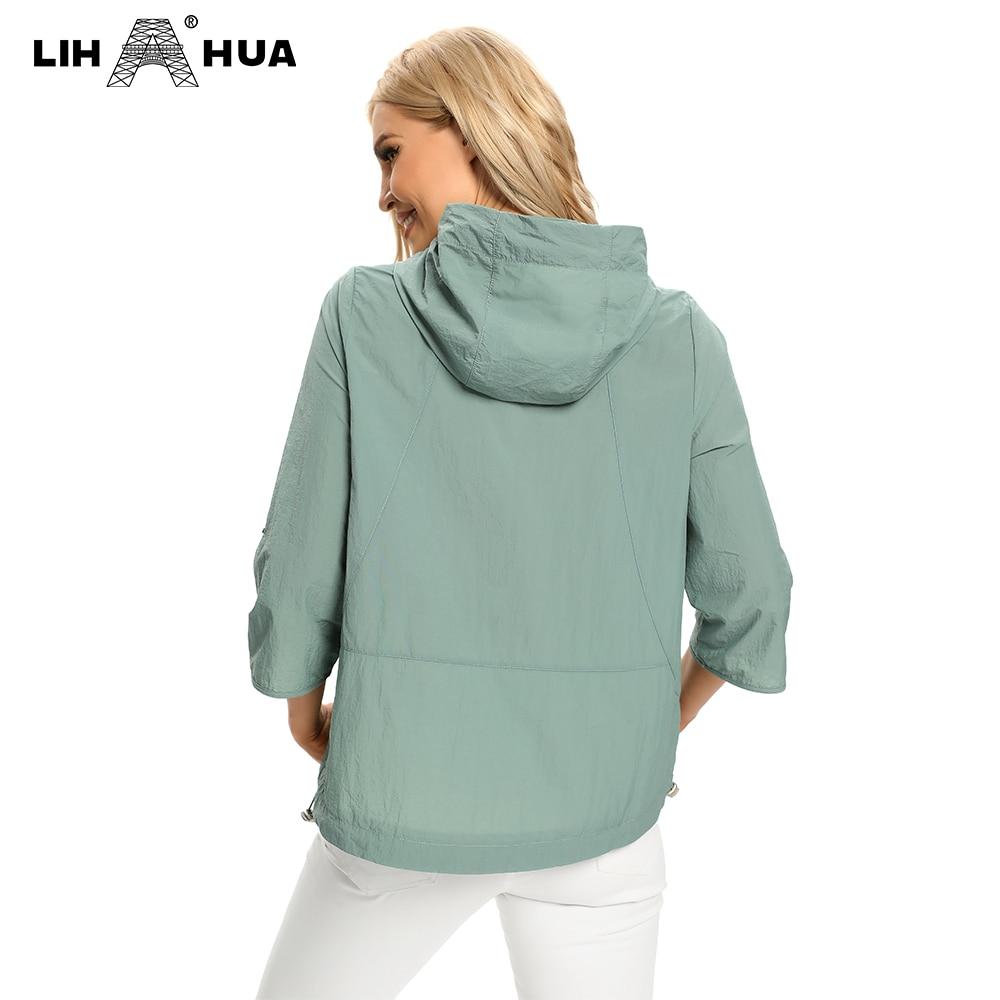 Women's Plus Size Windbreaker Short Hooded Jacket in denim fabric, featuring a casual design with a zipper closure and hood, perfect for spring and autumn.