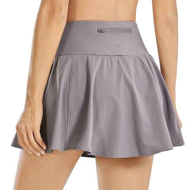 Women's Quick Dry High Waisted Tennis Skirt in black with pleated design and pockets, perfect for sports and casual wear.