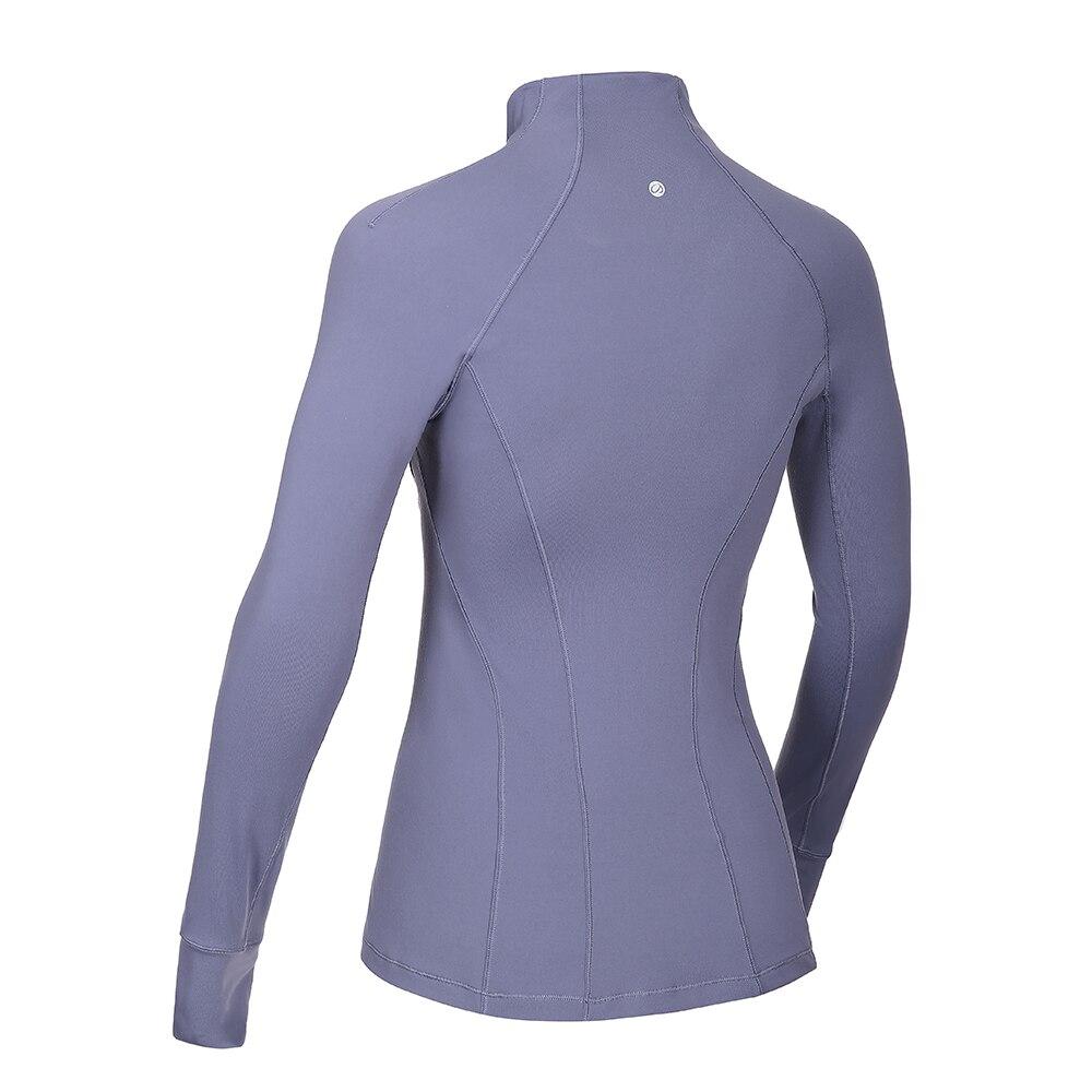 Women's long sleeve athletic workout shirt with quarter-zip design, perfect for running and yoga, made from breathable polyester blend.