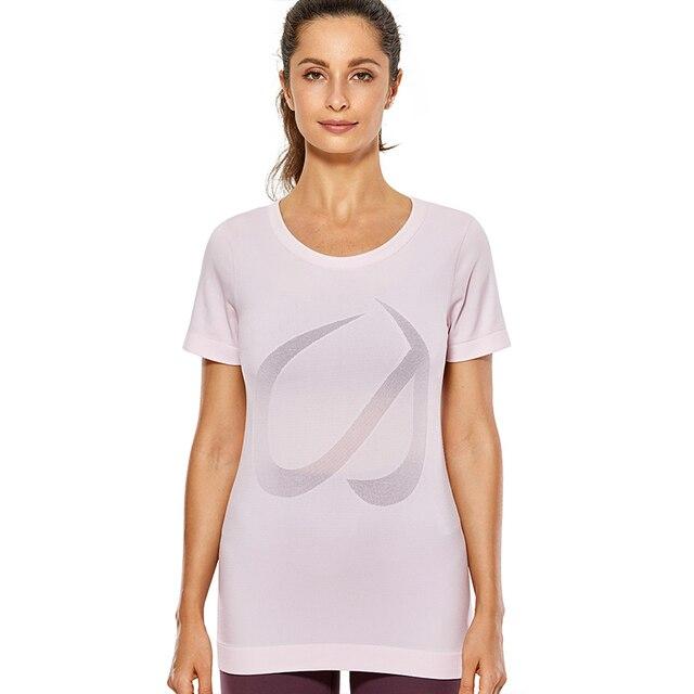 A stylish women's seamless active top in a vibrant color, designed for workouts and running, featuring short sleeves and a breathable fabric.