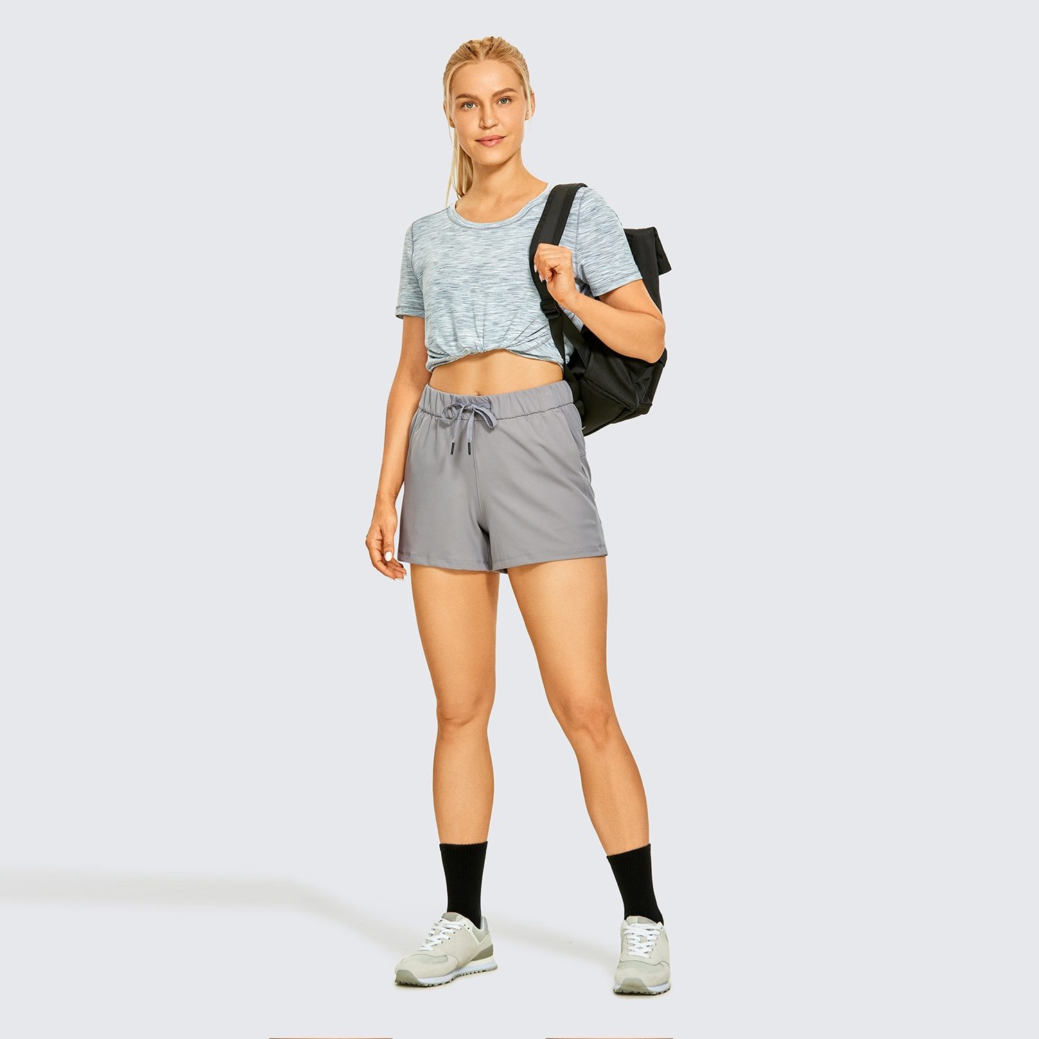 Women's Stretch Lightweight Athletic Shorts featuring an elastic waist and drawstring, perfect for workouts and travel, with pockets for convenience.