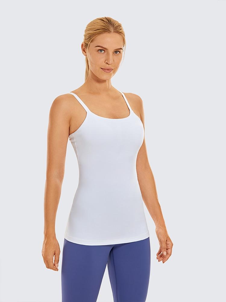 A stylish women's workout tank top featuring adjustable spaghetti straps and a built-in bra, perfect for yoga and athletic activities.