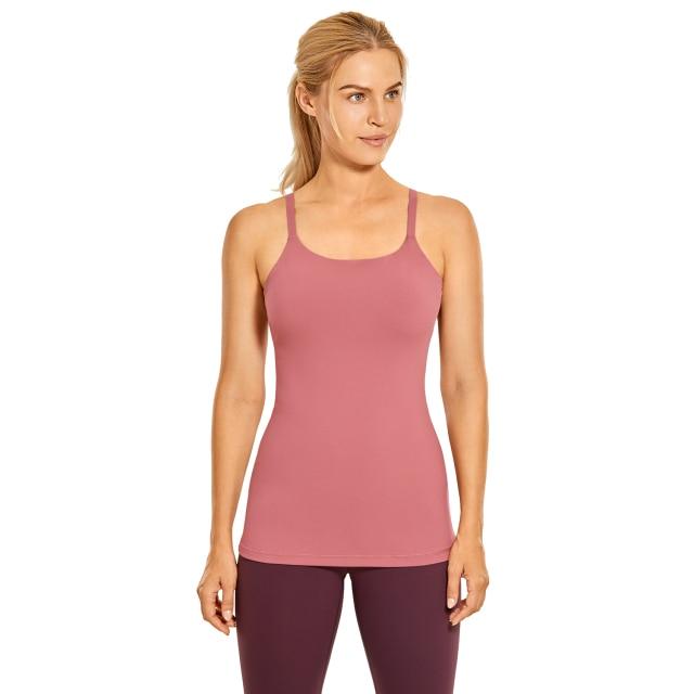 A stylish women's workout tank top featuring adjustable spaghetti straps and a built-in bra, perfect for yoga and athletic activities.