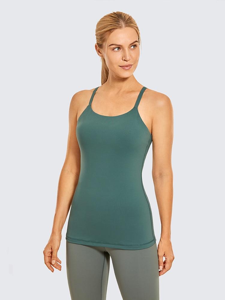 A stylish women's workout tank top featuring adjustable spaghetti straps and a built-in bra, perfect for yoga and athletic activities.