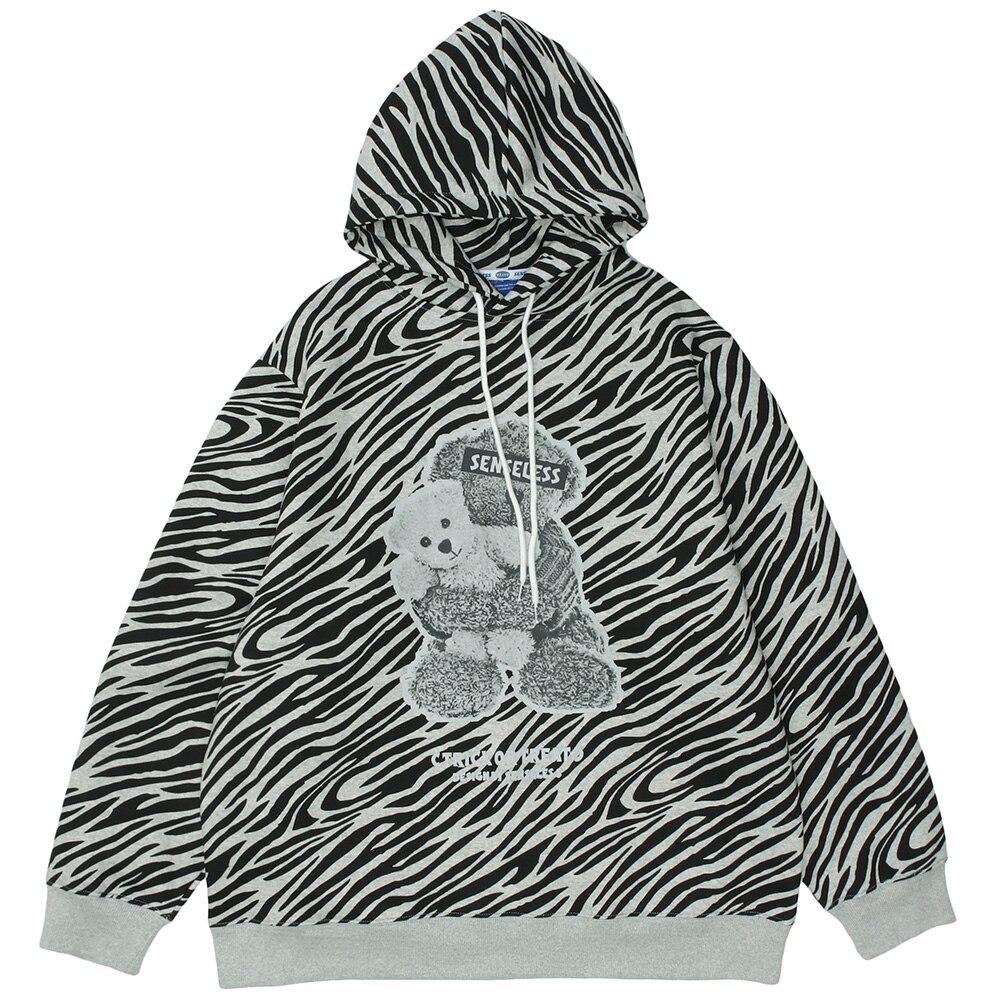 Men's zebra striped furry cartoon bear printed hoodie in light gray and dark gray, showcasing a playful design and cozy fleece material.