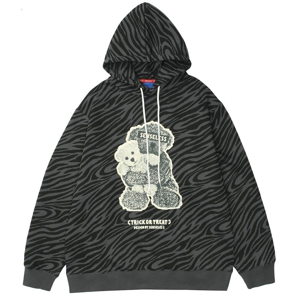 Men's zebra striped furry cartoon bear printed hoodie in light gray and dark gray, showcasing a playful design and cozy fleece material.