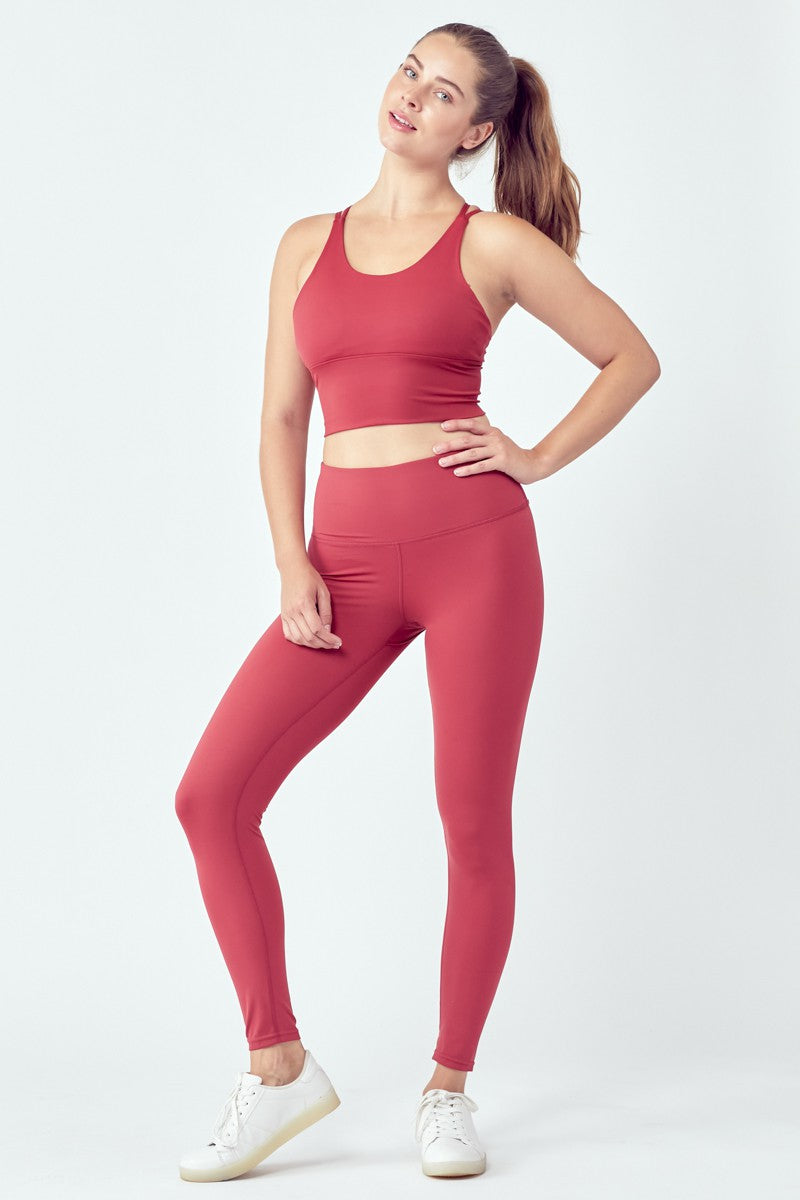 Person in red workout attire.