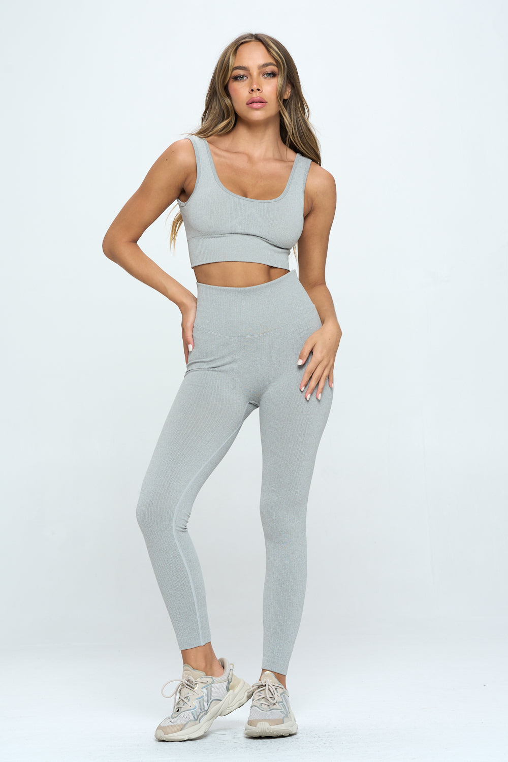 A stylish 2 Piece Seamless Ribbed Set featuring a high-waisted cropped top and matching bottoms in multiple colors, perfect for workouts and casual wear.