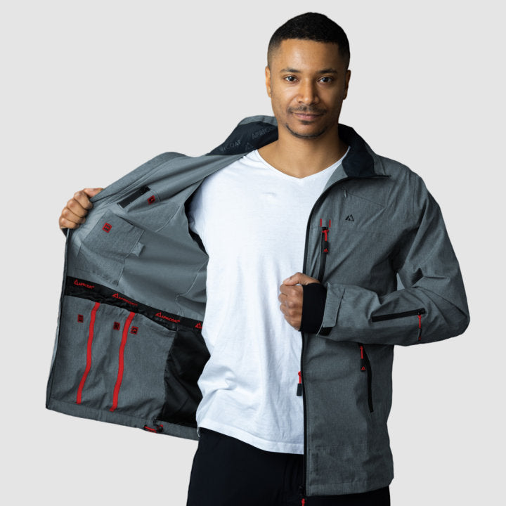 Adventure 2.0 Men Gray jacket featuring multiple pockets, waterproof fabric, and stylish design, ideal for outdoor activities.