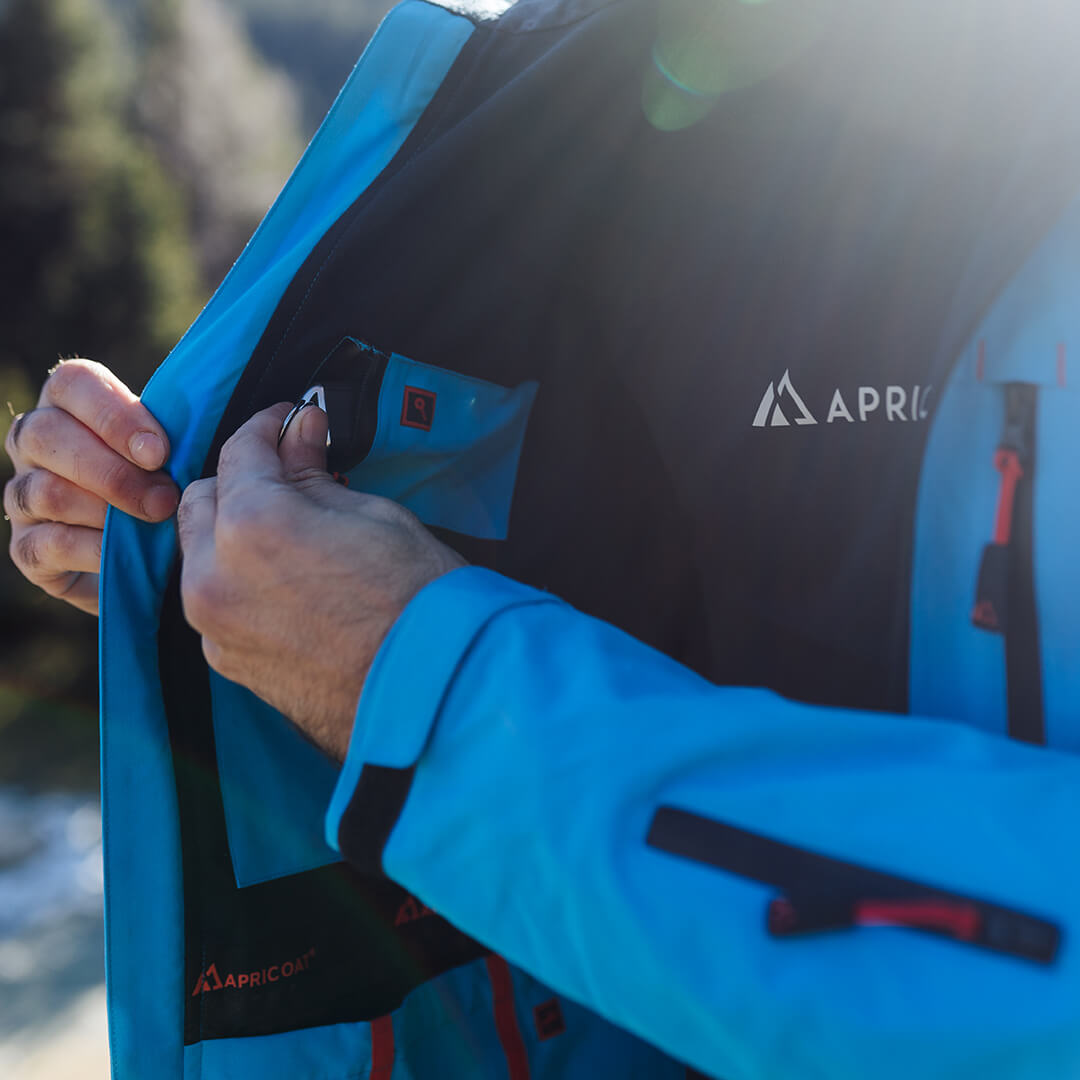 Adventure 2.0 Men Light Blue jacket featuring multiple pockets and eco-friendly materials, perfect for outdoor activities.