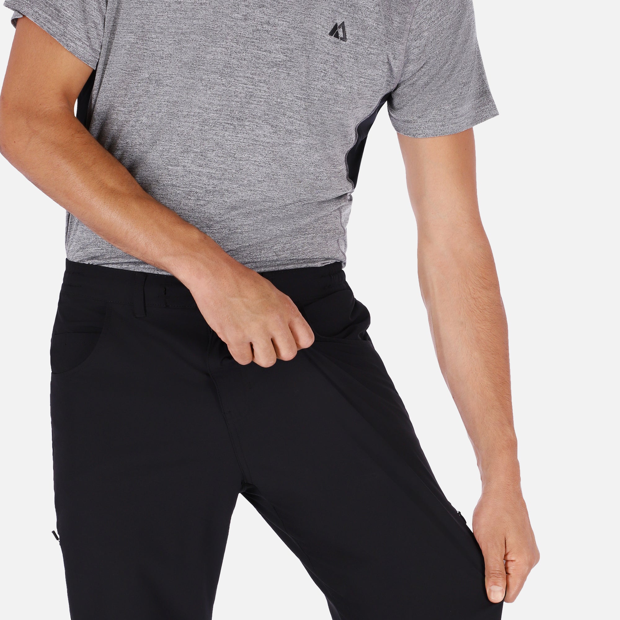 Men's black Adventure Pants featuring multiple pockets and a stylish design, perfect for outdoor activities.