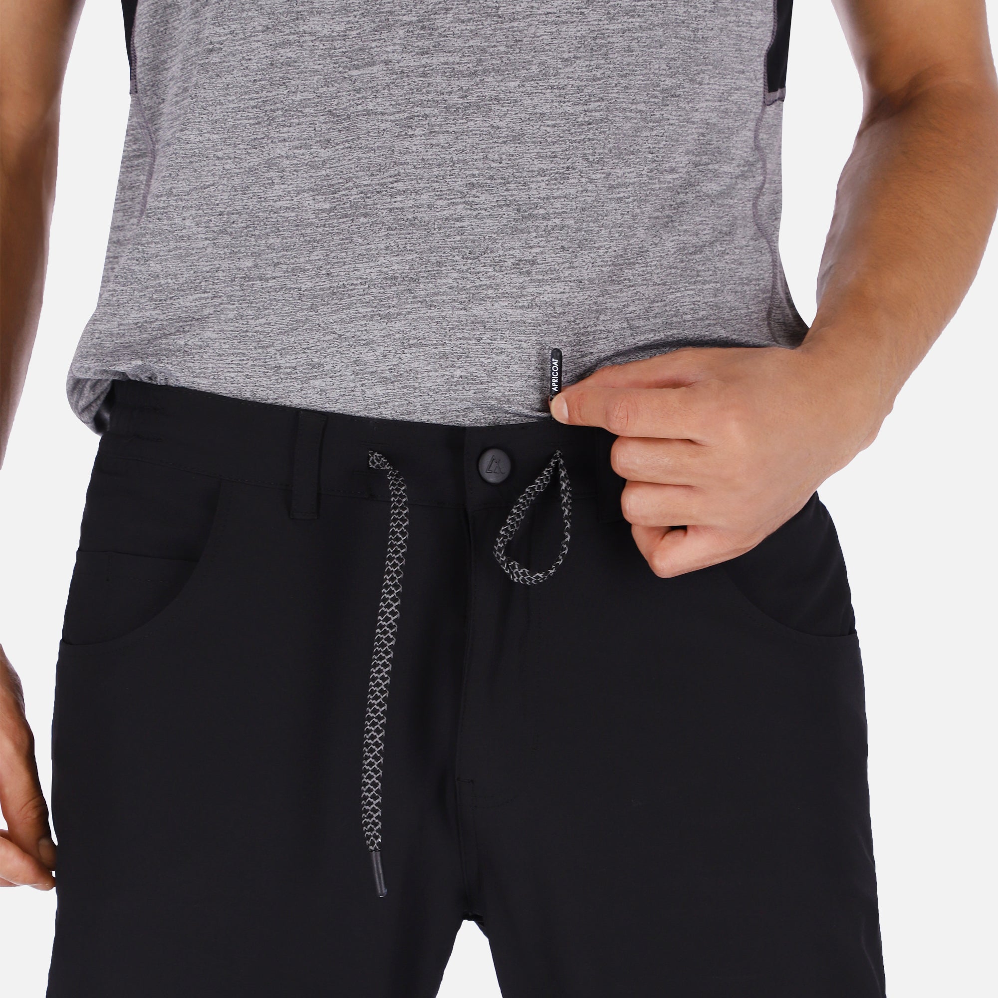 Men's black Adventure Pants featuring multiple pockets and a stylish design, perfect for outdoor activities.