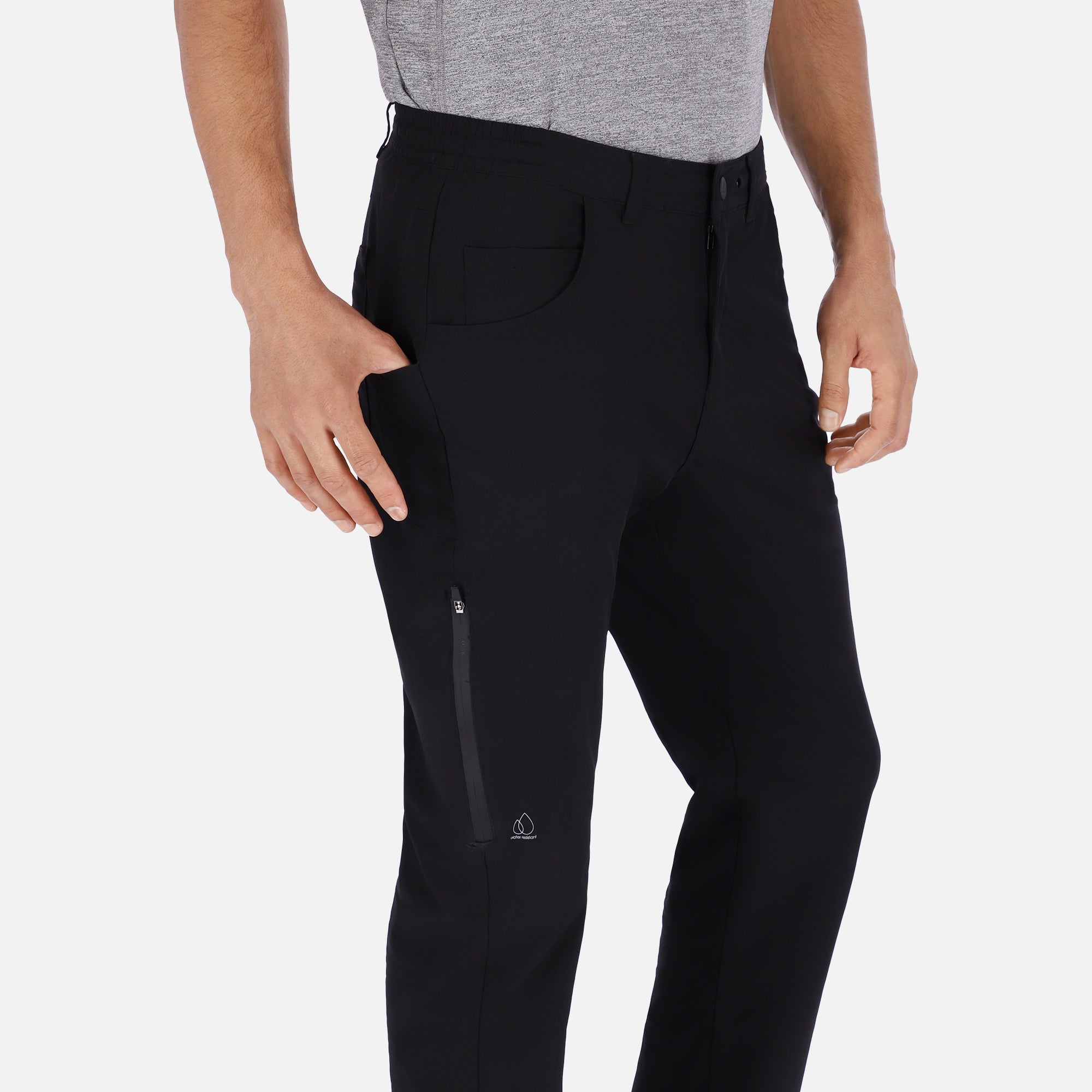 Men's black Adventure Pants featuring multiple pockets and a stylish design, perfect for outdoor activities.