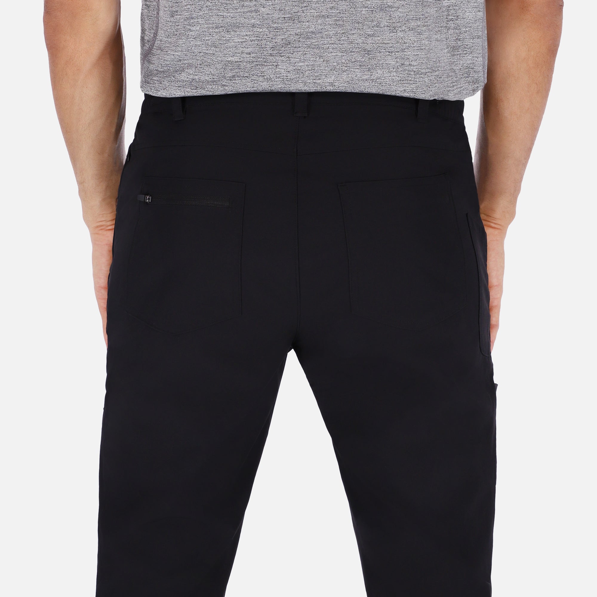 Men's black Adventure Pants featuring multiple pockets and a stylish design, perfect for outdoor activities.