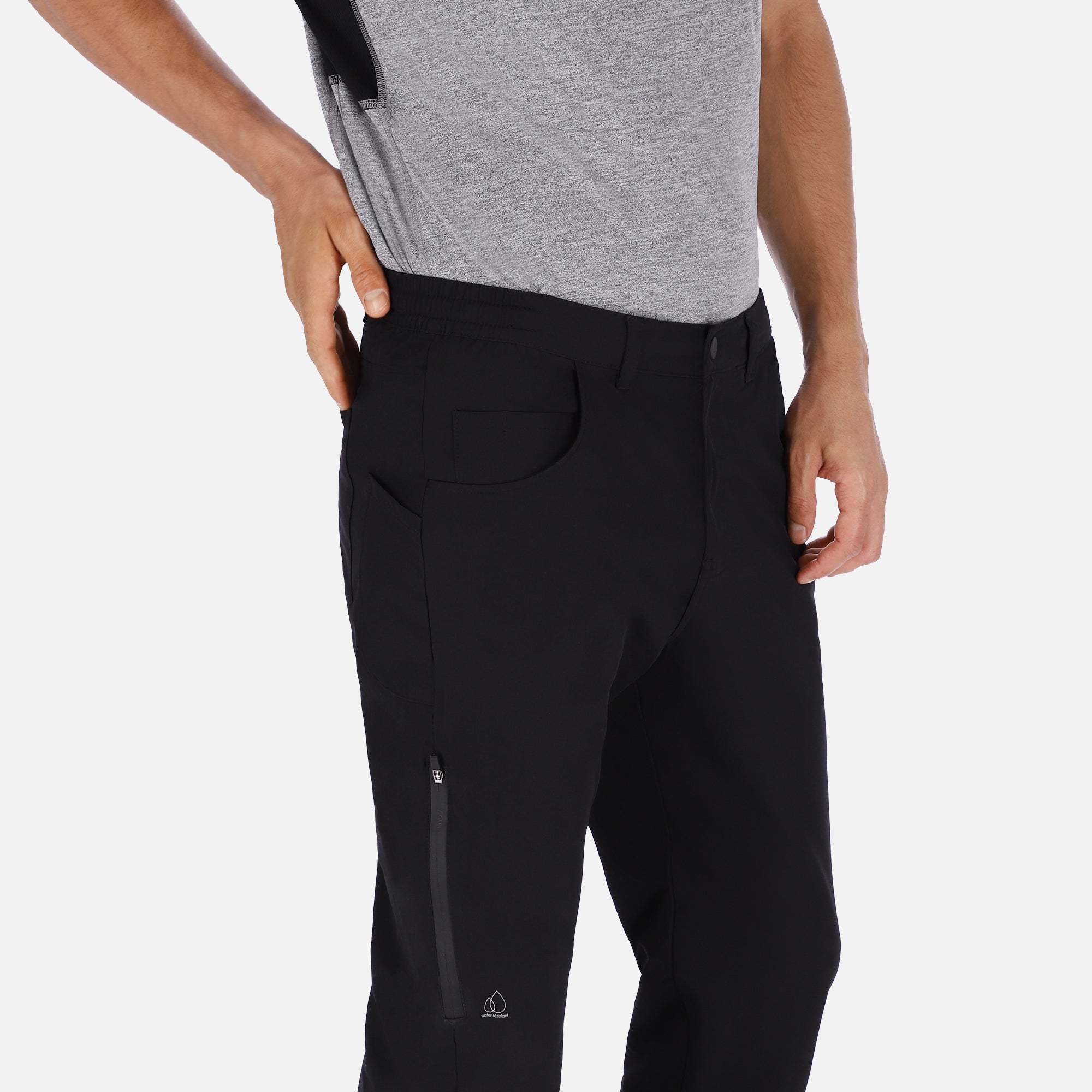 Men's black Adventure Pants featuring multiple pockets and a stylish design, perfect for outdoor activities.