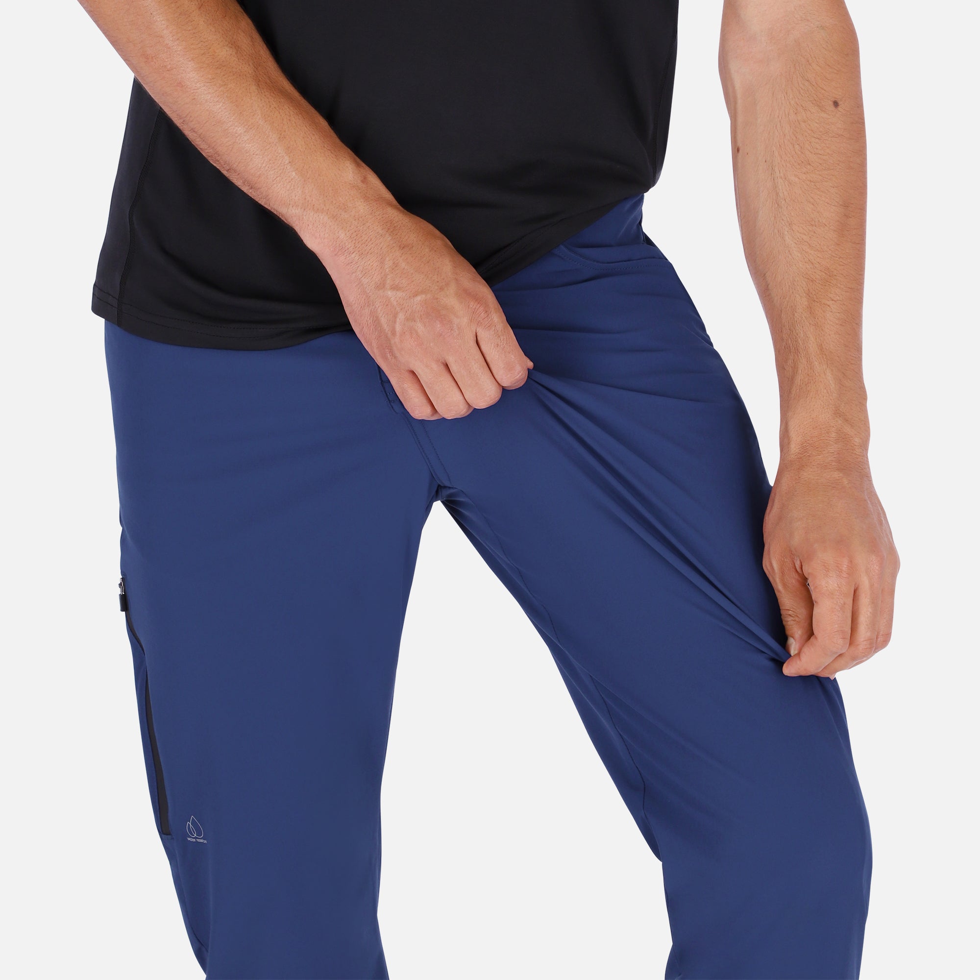 Men's navy blue Adventure Pants featuring multiple pockets and a stylish design, perfect for outdoor activities.