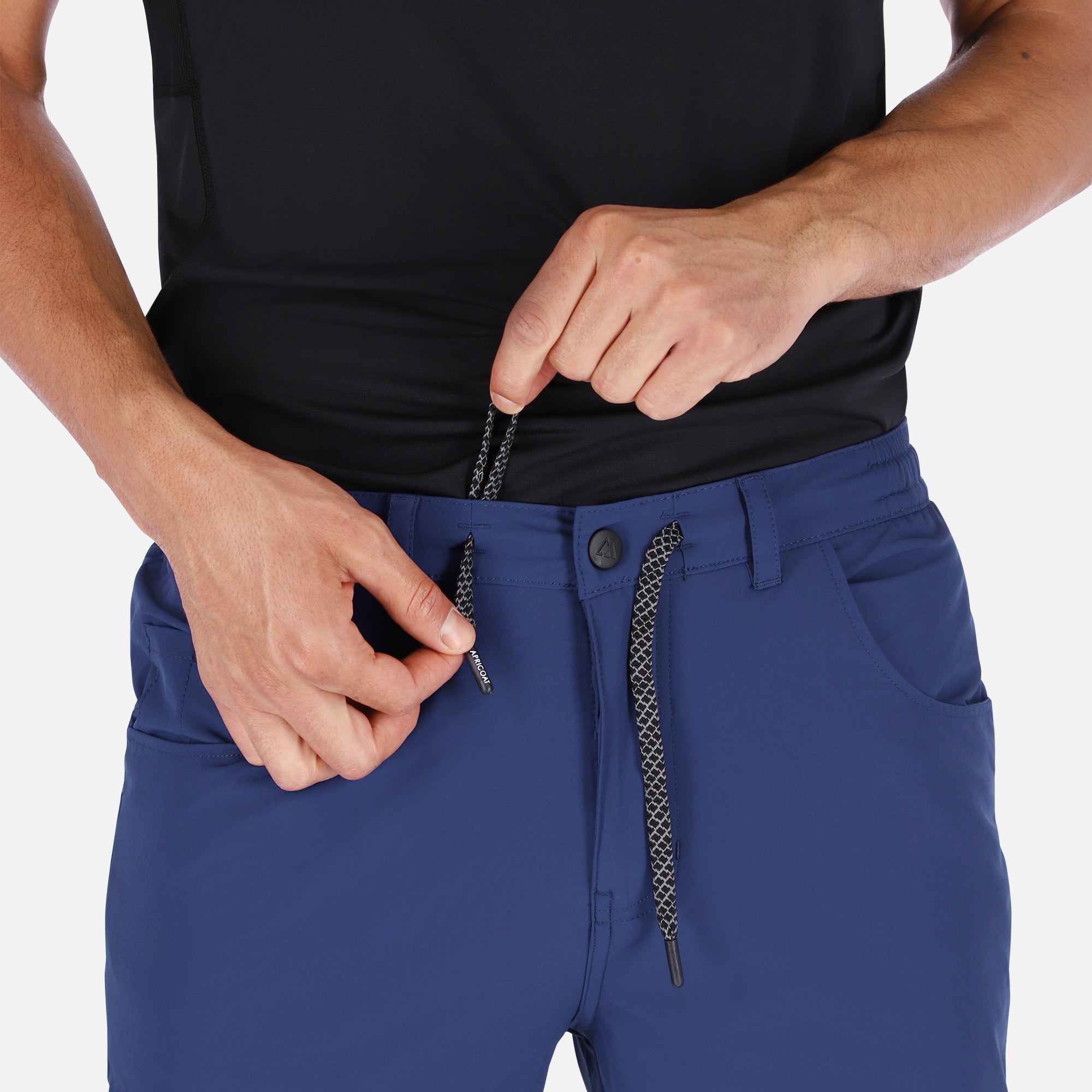 Men's navy blue Adventure Pants featuring multiple pockets and a stylish design, perfect for outdoor activities.