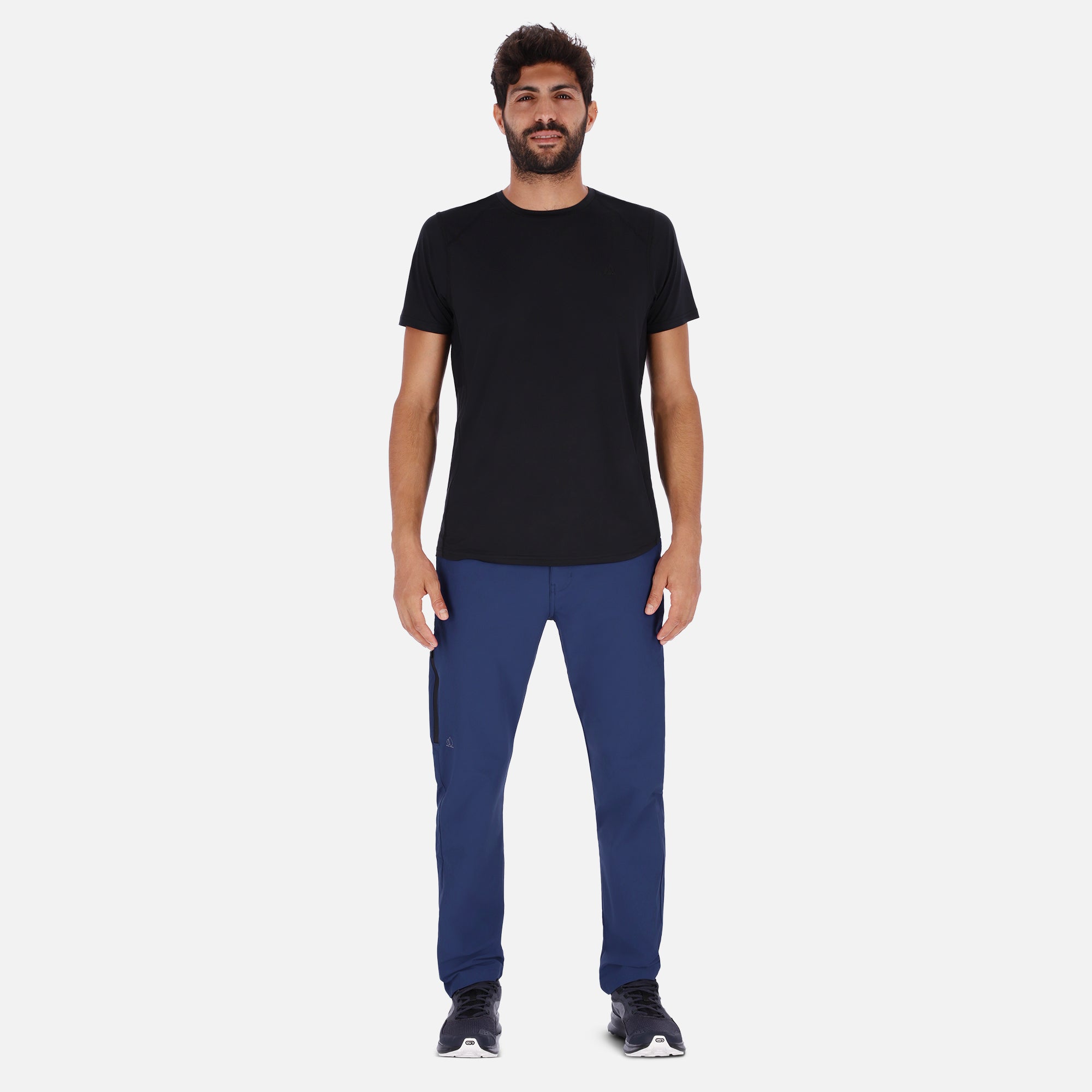 Men's navy blue Adventure Pants featuring multiple pockets and a stylish design, perfect for outdoor activities.