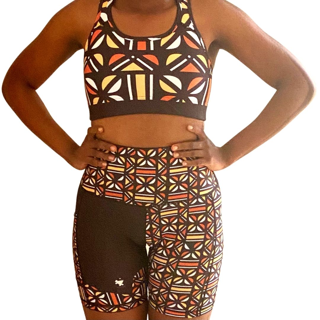 Adyre High Rise Biker Shorts featuring a vibrant Batik pattern, high waist design, and side pocket for phone storage.