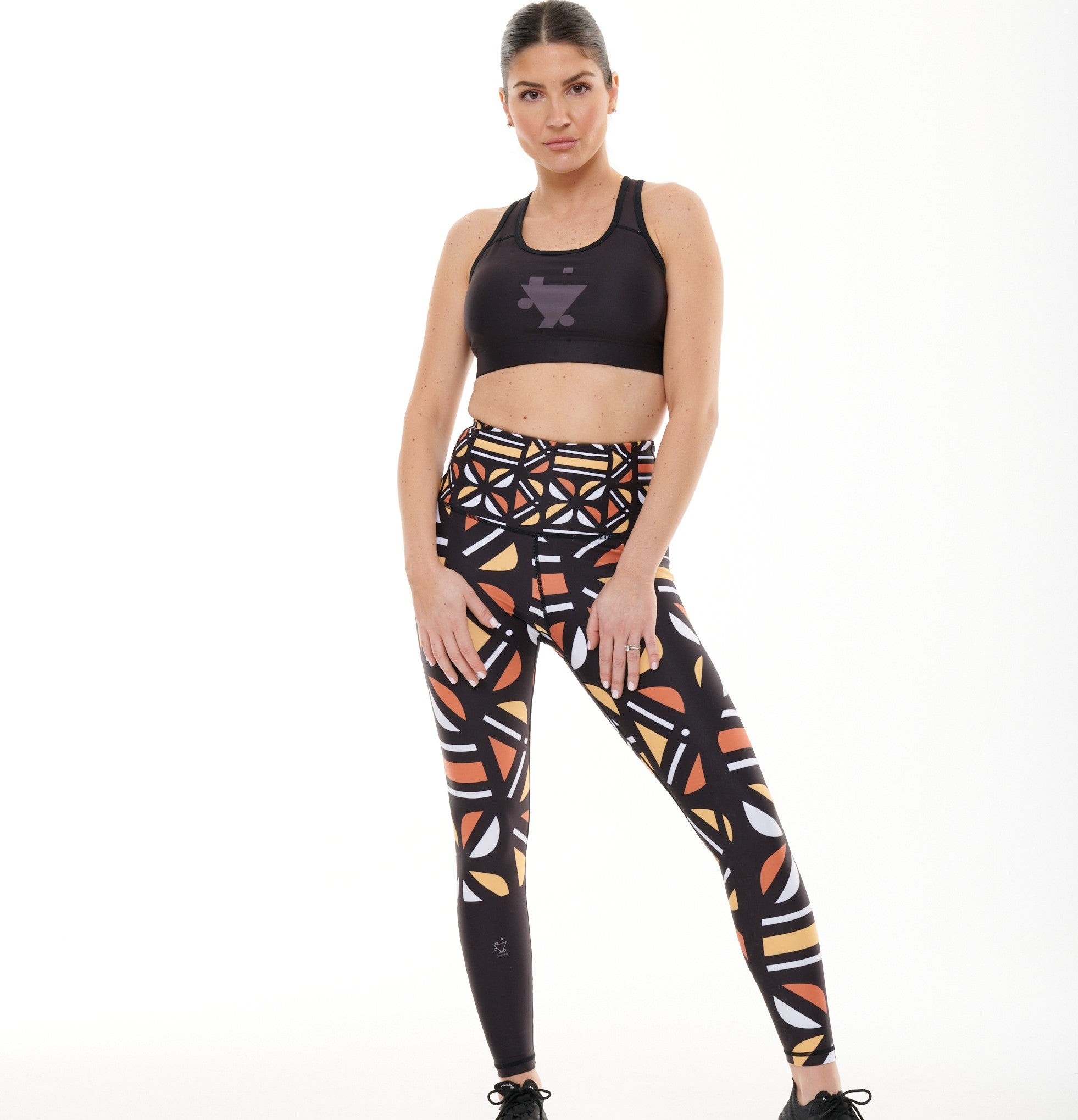 TYNA Batiq Vibrant Leggings featuring colorful Indonesian Batik print, designed for high performance and comfort.