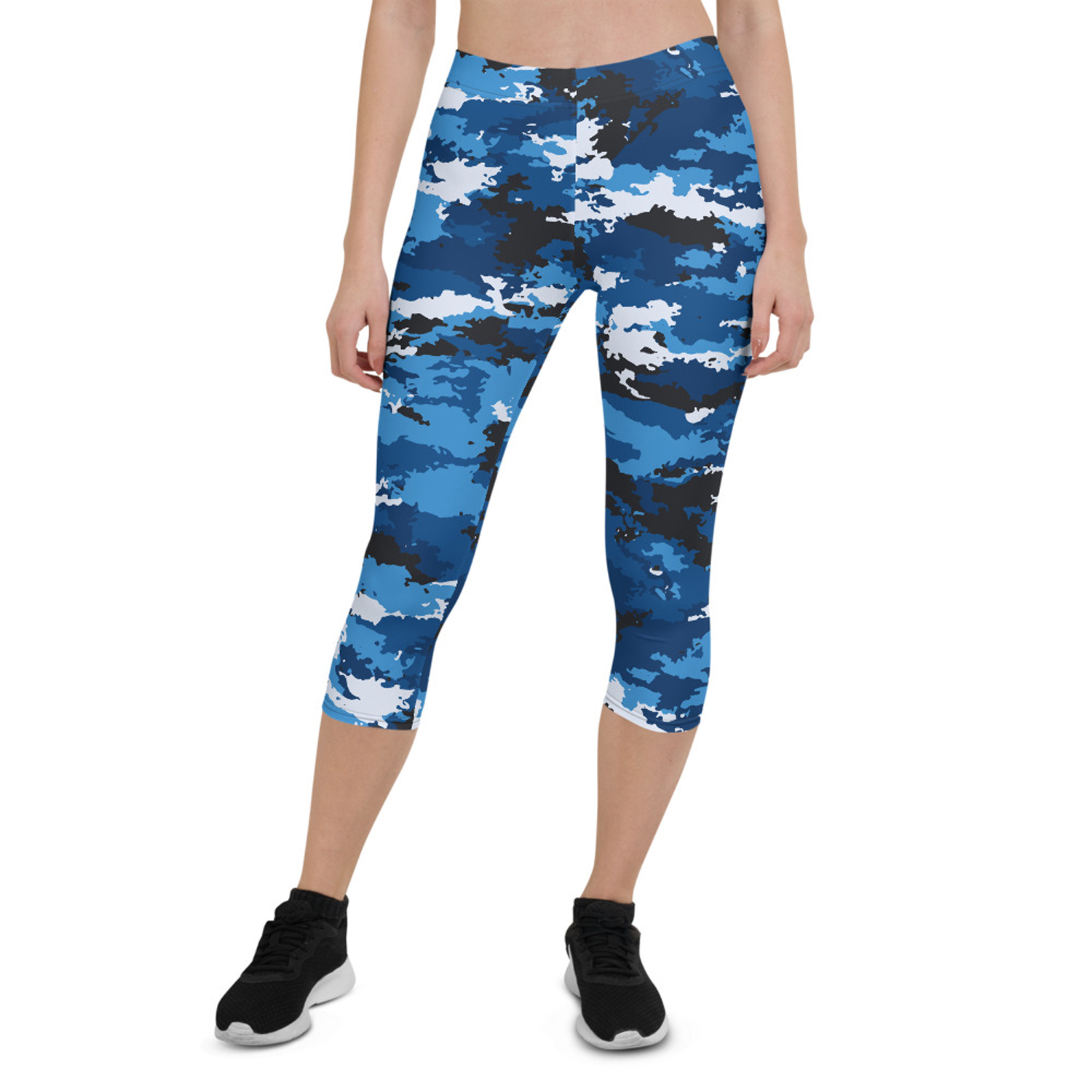 A pair of women's blue camo capri leggings, showcasing a unique and vibrant design, made from high-performance fabric for comfort and flexibility during workouts.