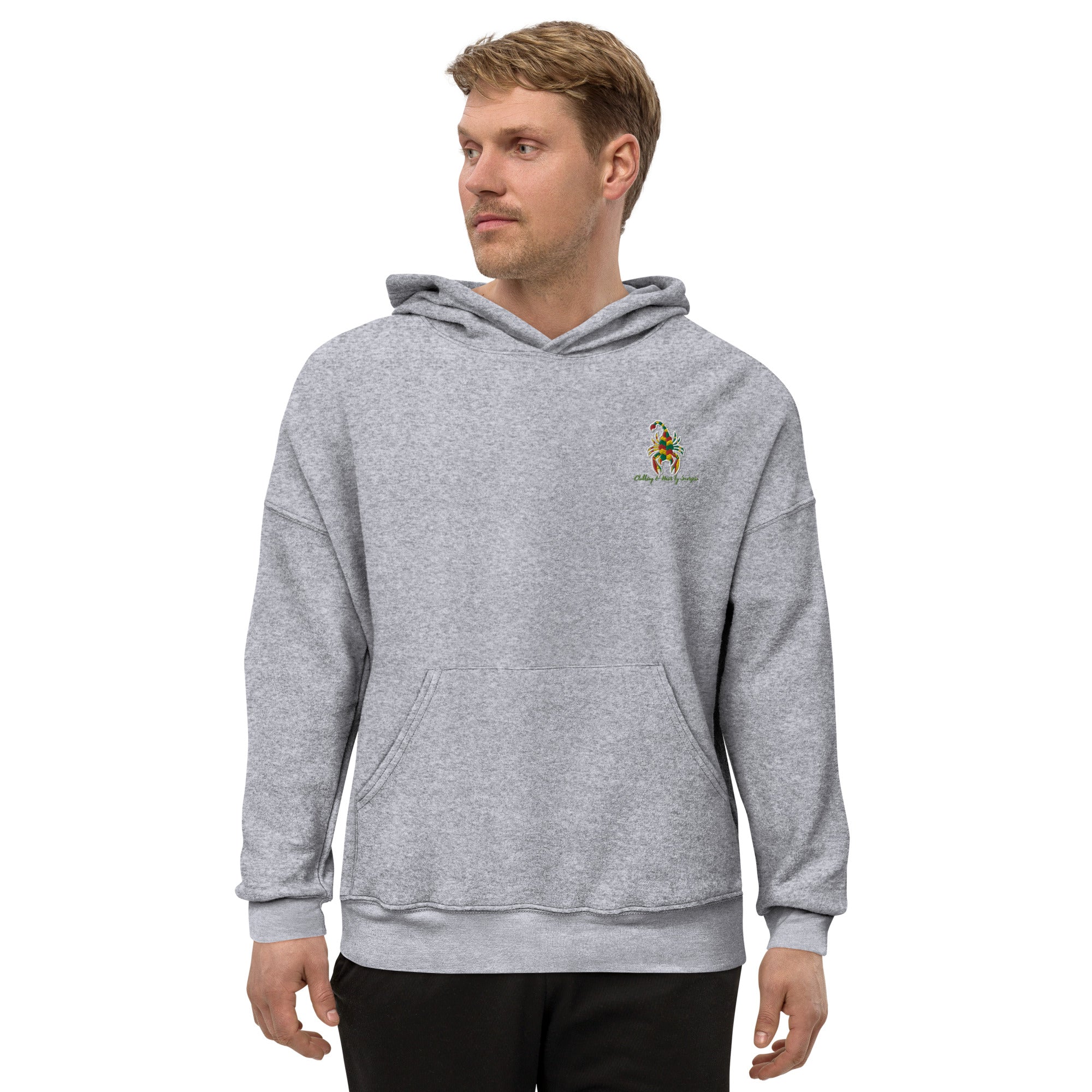 A soft and comfortable CHBS unisex sueded fleece hoodie in a casual style, featuring a front pouch pocket and dropped shoulder design.