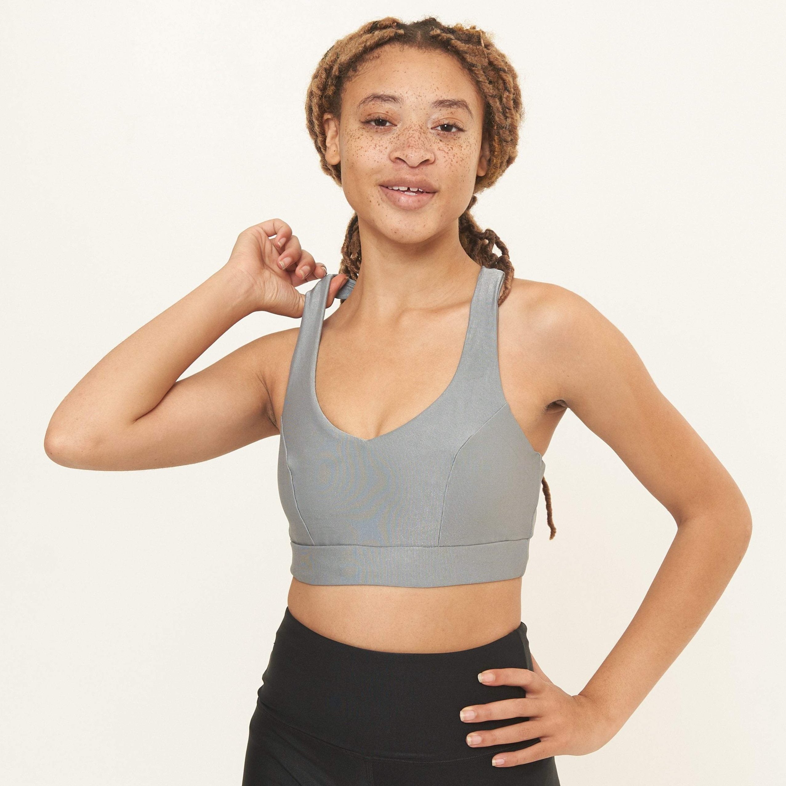 Classic Performance Bra Top in Dove Grey Rib Pattern, showcasing its stylish design and comfortable fit, perfect for workouts and casual wear.