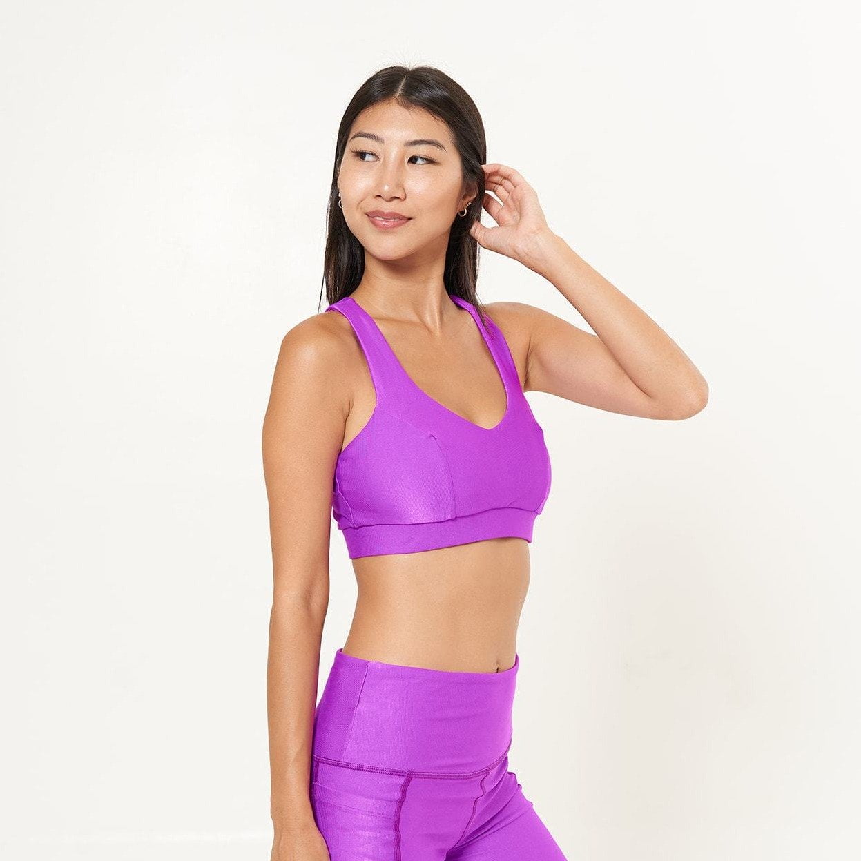 Classic Performance Bra Top in Fuchsia Rib Pattern, showcasing its stylish design and comfortable fit, perfect for workouts.