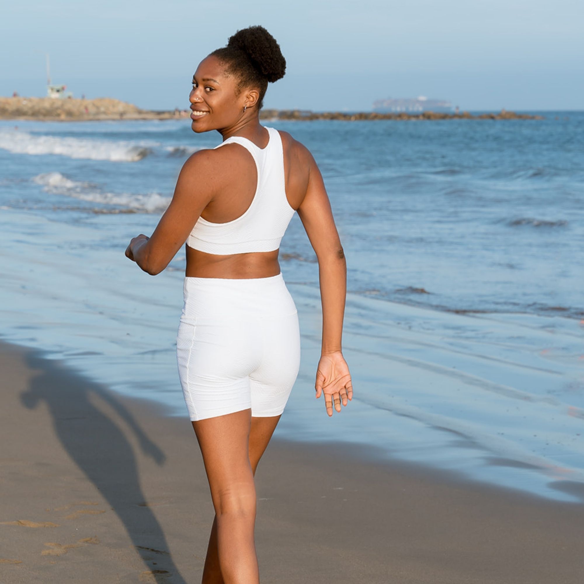 Classic Performance Bra Top in white rib pattern, designed for comfort and support during workouts.