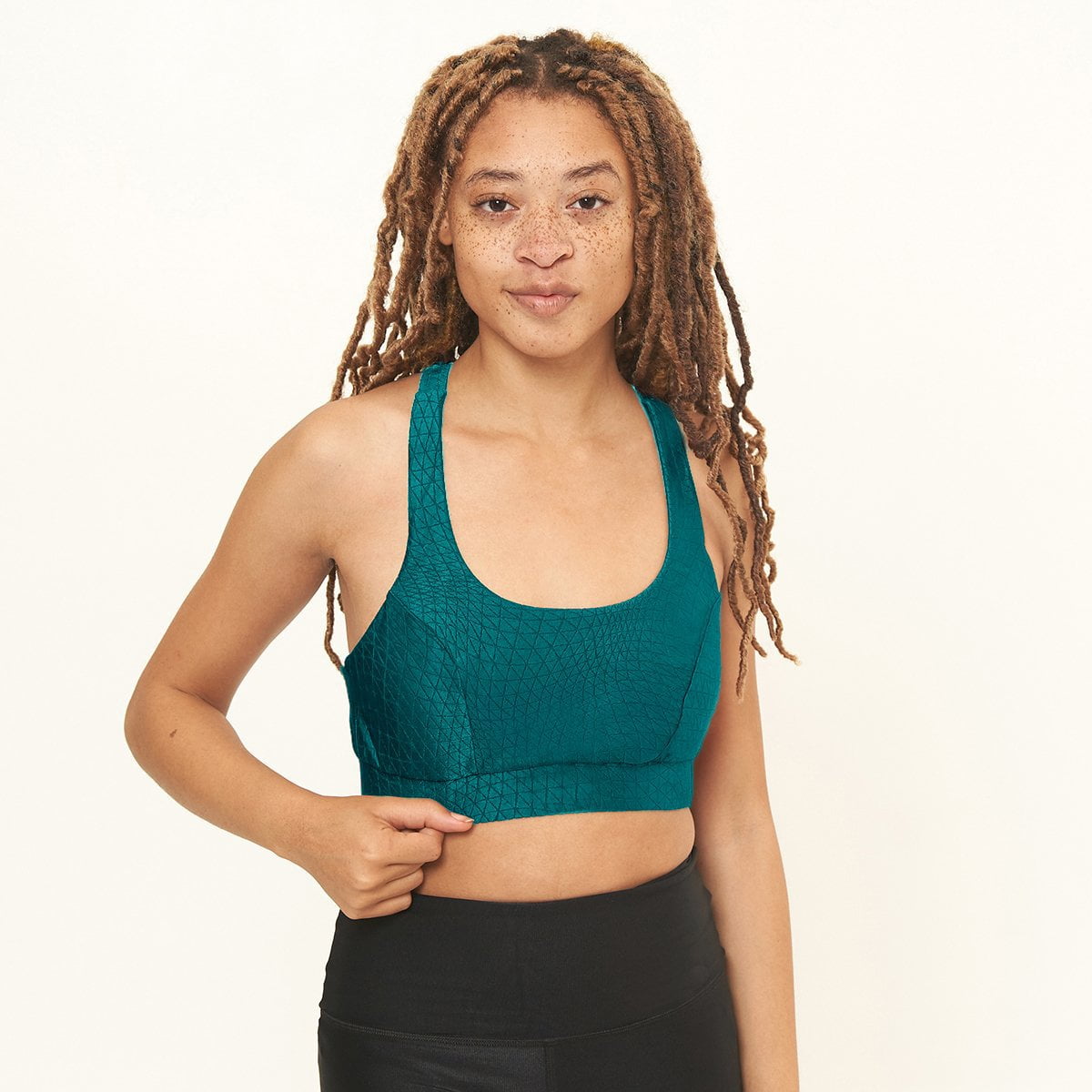 Cross Back Performance Bra Top featuring a Tropicale Cube Pattern, designed for comfort and support during workouts.