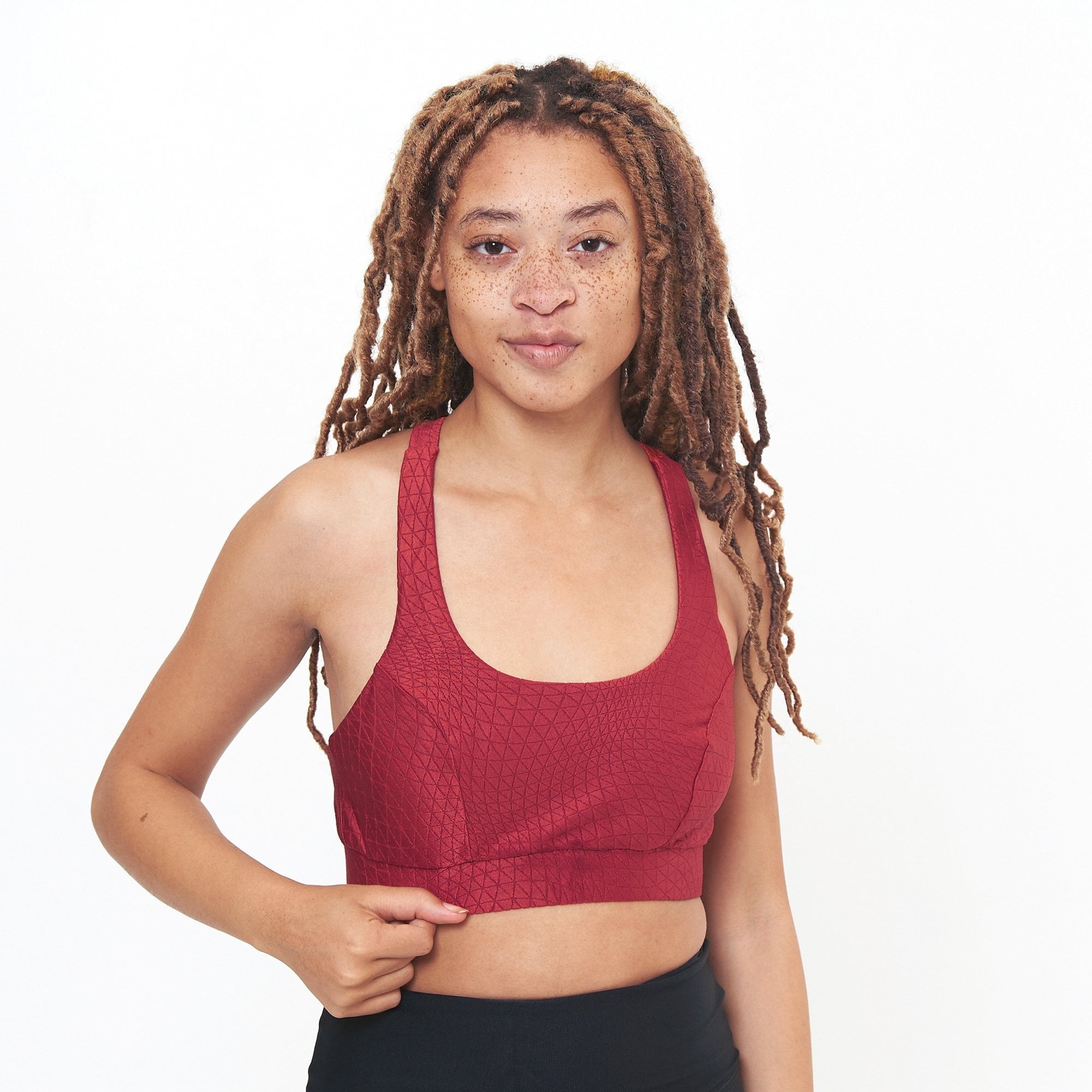 Lola Getts Double Scoop Bra Top in Pomegranate Cube Pattern, showcasing its stylish design and comfortable fit.