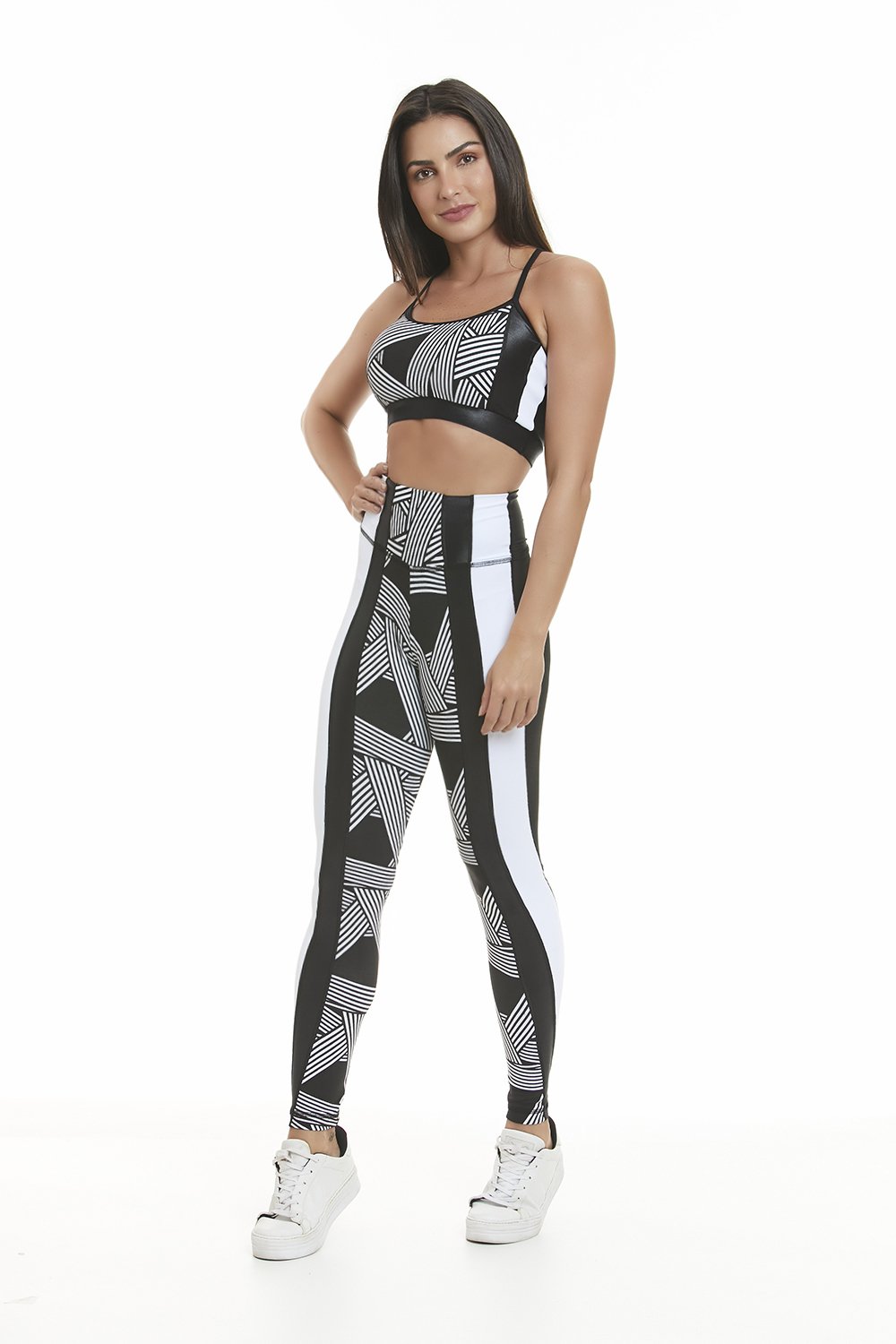 DUALITY SPORTS BRA featuring double inner layer, wire-free design, and stylish optical effect print, made from breathable and supportive fabric.